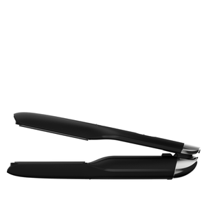 ghd unplugged Styler schwarz + mini paddle Brush gratis
